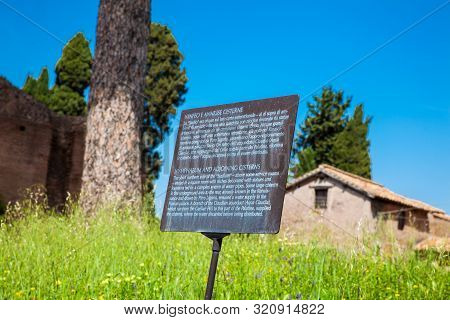 Rome, Italy - April, 2018: Informative Sign At The Nymphaeum And Adjoining Cisterns At The Palatine 