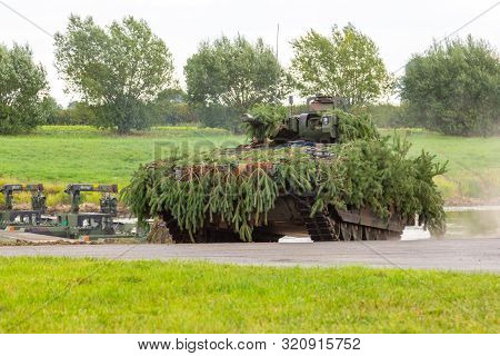 German Army Infantry Fighting Vehicle  Drives On Tactical Exercise At Military Training Area