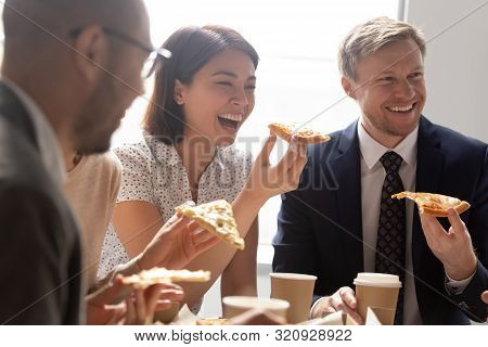 Close Up Young Korean Female Employee Bursting In Laugh.