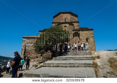 Mtskheta, Georgia - August 2019: Jvari Church View And Visitors. Jvari Church Is A Beautiful Sixth C