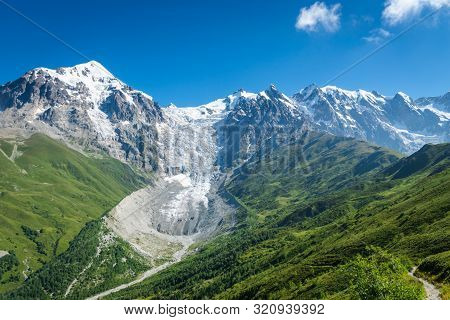 Svaneti Landscape With Glacier And Snow-capped Mountain In The Back Near Mestia Village In Svaneti R