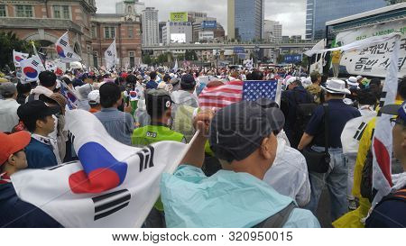 Seoul, South Korea; September 7, 2019: Large Crowd Of People At Seoul Station Plaza For Protest Demo