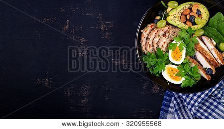 Ketogenic Diet. Buddha Bowl Dish With Meatloaf, Chicken Meat, Avocado, Berries And Nuts. Detox And H