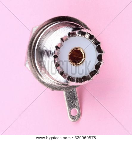 Radio Connector On Pink Background At Dry Sunny Summer Day