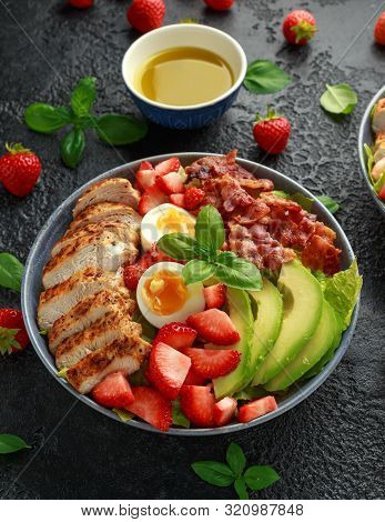 Chicken Cobb Salad With Strawberries, Bacon, Avocado And Boiled Eggs