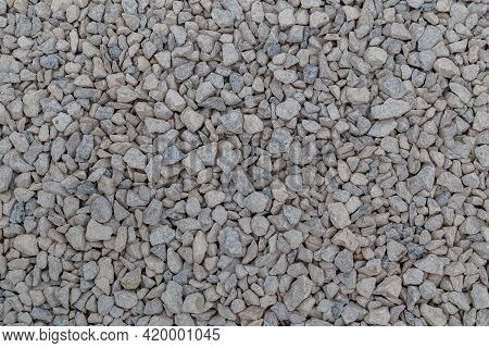 Dry White Limestone Ballast Flat Full Frame Background. Small Gray Dusty Broken Macadam Stones Textu