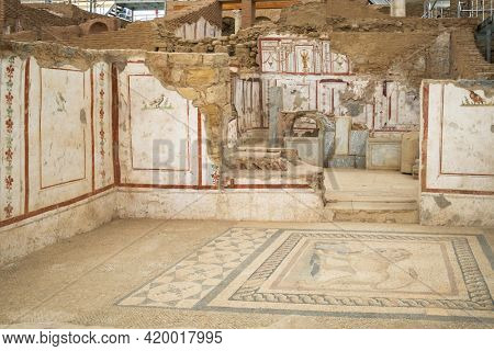 Ruins of antique terrace houses in Ephesus ancient city. Ancient rooms with fresco painting on walls and floor mosaics, Selcuk province, Turkey