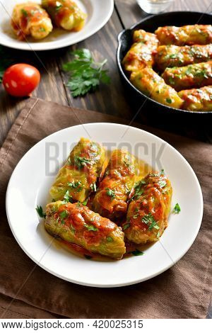 Cabbage Rolls Stuffed With Ground Beef, Rice And Baked With Tomato Sauce. Close Up View