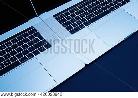 London, United Kingdom - Jan 9, 2018: Two New Professional Apple Macbook Pro 16 15 Laptops On The Sa