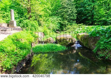 View Of The Small Stream And Truncated Column In Sofiyivka Park In Uman, Ukraine