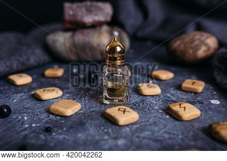 Small Glass Bottle With Natural Magic Oil. Cosmetic And Magic Elixir.