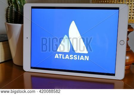 May 2021 Milan, Italy: Atlassian Company Logo Icon Close-up On Tablet. Atlassian Brand Illustration