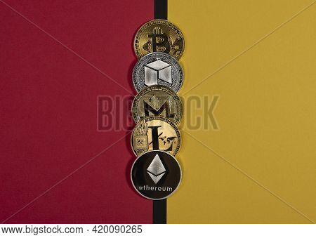 Different Shining Cryptocurrency Coins, Crypto Currency Concept. Pros And Cons, Pluses And Minuses,
