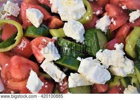 Vegetable Salad With White Cheese Cucumber Tomatoes And Peppers