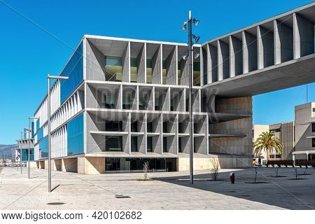 PALMA, SPAIN - MAY 10, 2019: View of modern Convention Centre building and city street under blue sky in Palma - capital city of Balearic islands, famous tourist resort and travel destination.