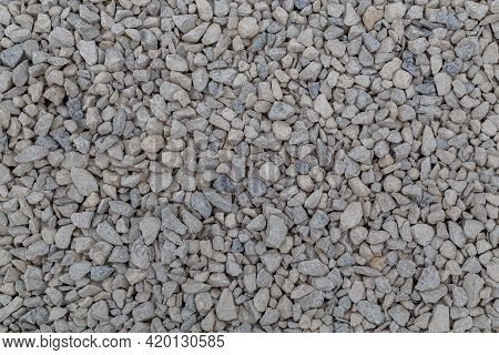 Dry White Limestone Ballast Flat Full Frame Background. Small Gray Dusty Broken Macadam Stones Textu
