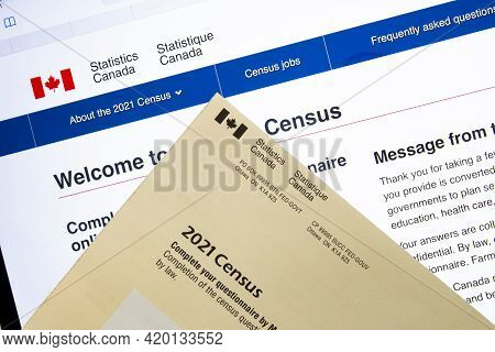 Calgary, Alberta, Canada. May 11, 2021. An Online Census Questionnaire And Paper Mail.