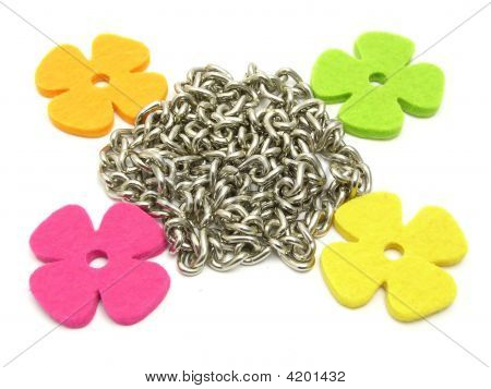 Flowers Of Felt Fraiming A Chain