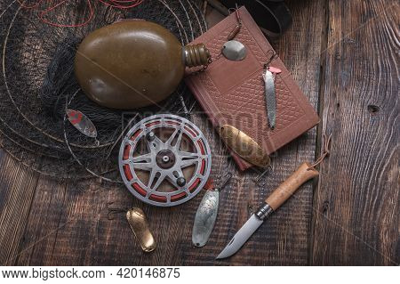 Vintage Fishing Still Life. Fishing Things On The Table. Knife And Tackle On The Table.