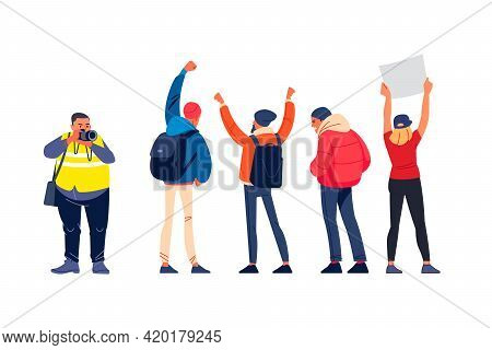 Press Photographer Journalist Taking Photographs, Documenting Protest March Through Streets, Demonst