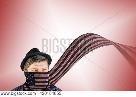 A Middle-aged Man With A Scarf-covered Face Looks Thoughtfully Away. A Hat With Narrow Brim On His H