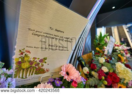 KUALA LUMPUR, MALAYSIA - JANUARY 18, 2020: close up shot of congratulation card with opening ceremony flowers at Sephora store in Fahrenheit 88 shopping mall in Kuala Lumpur.