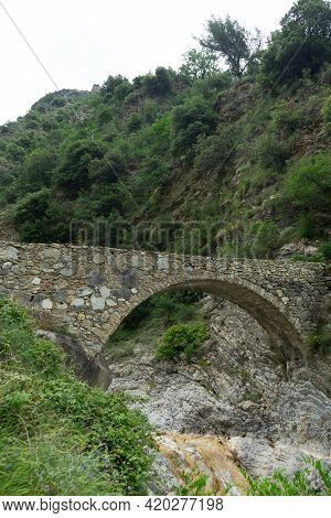 Stone Bridge In The Nervia Valley View Near The Rio Barbaira Stream, Rocchetta Nervina, Liguria - It