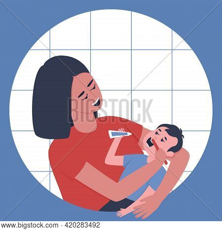 Mom Lovingly Brushes Her Baby's Teeth. Mother's Care For The Health Of The Baby's Milk Teeth. Young 