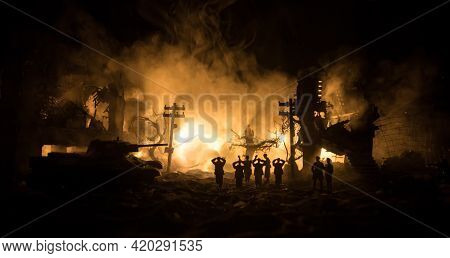 Battle Scene. Military Silhouettes Fighting Scene On War Fog Sky Background. A German Soldiers Raise