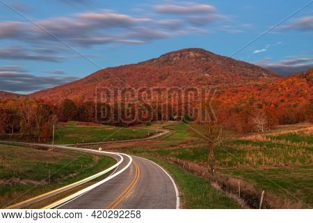 Yonah Mountain, Georgia, USA in autumn with rural roads at dusk.