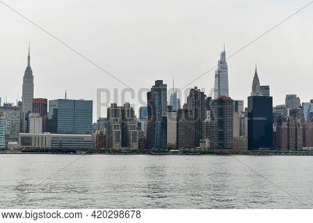 New York City Skyline From Transmitter Park In Greenpoint, Brooklyn.