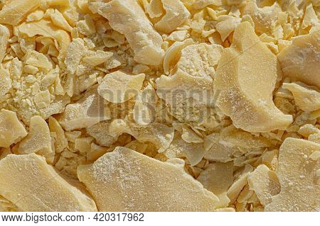 Pieces Of Crushed Cocoa Butter, Chocolate Ingredient Close Up.