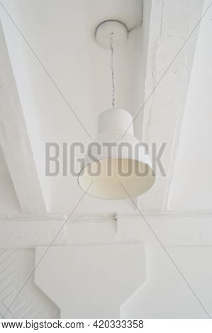 White Metal Plafond On The Ceiling. Light Interior, Loft Style.