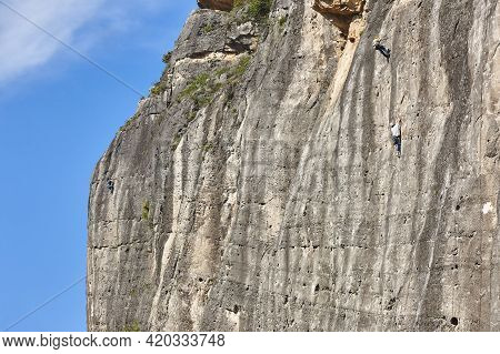 Climbers On A Granite Wall. Extreme Sport. Outdoor Mountain Activity