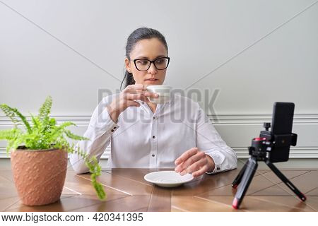 Young Woman Blogger Vlogger Recording Broadcast At Home