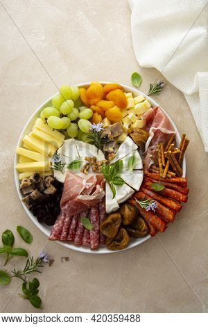 Charcuterie Assortment, Variety Of Cheeses And Salami, Prosciutto And Dried Fruits, Figs, Apricots, 