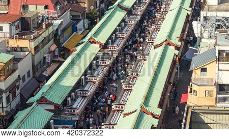 Tokyo, Japan - Oct 31, 2019: Motion Blur Of People Walking On Nakamise-dori Shopping Street In Senso
