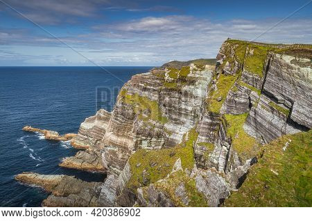 Tourists Standing On The Top Of Majestic And Beautiful Kerry Cliffs With A View On Atlantic Ocean, S