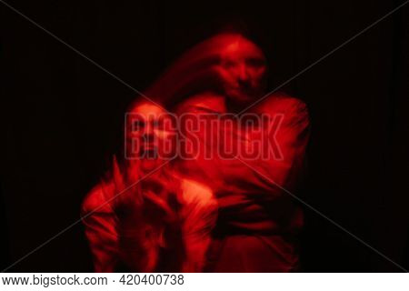 Blurry Portrait Of A Psychopathic Girl With Schizophrenic Mental Disorders