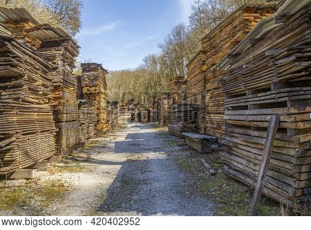 Lots Of Stacked Wooden Boards On A Lumber Yard In Sunny Ambiance