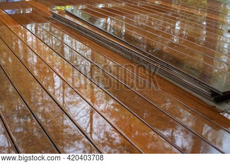 Ipe Hardwood Plank Terrace On Rainy Day. Close Up.
