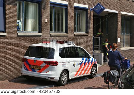 Amsterdam, Netherlands - July 7, 2017: Police Officers In Front Of Police Station In Amsterdam, Neth