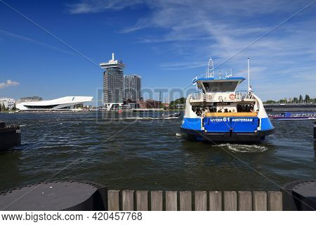 Amsterdam, Netherlands - July 9, 2017: People Ride The Ferry To Cross Ij Bay In Amsterdam, Netherlan