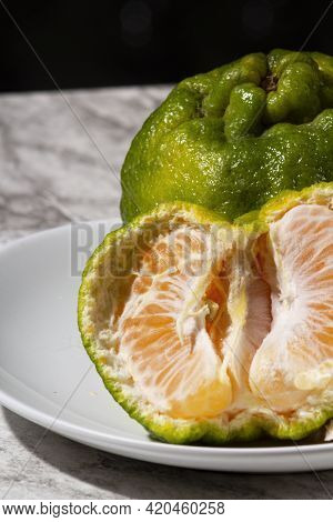 Fresh Tangerines On The Table. Selective Focus.