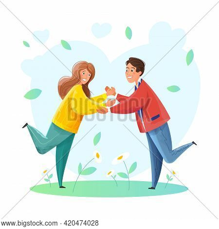 A Couple Of Young People In Love Go To Meet Each Other. Happy Lovers Man And Woman Smiling And Holdi