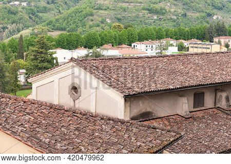 Old Tiled Roof. Beautiful Roofs In The Medieval Town Of Barga In Tuscany In The Mountains Of Italy.