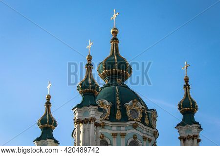 Green Domes Of The Kiev-pechersk Lavra Church Against The Blue Sky