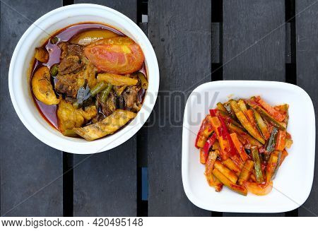 A Picture Of Meat Dalca And Spicy 