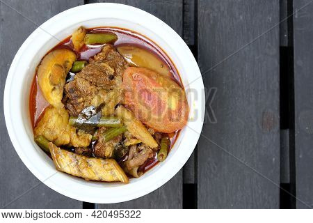 Flatlay And Copyspace Picture Of Beef Dalca Served During Eid Mubarak. Dalca Is A Stewed Vegetable C