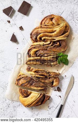 Fresh Pastries, Chocolate Day. Chocolate Babka Or Brioche Bread. Sweet Yeast Dough With Chocolate Fi